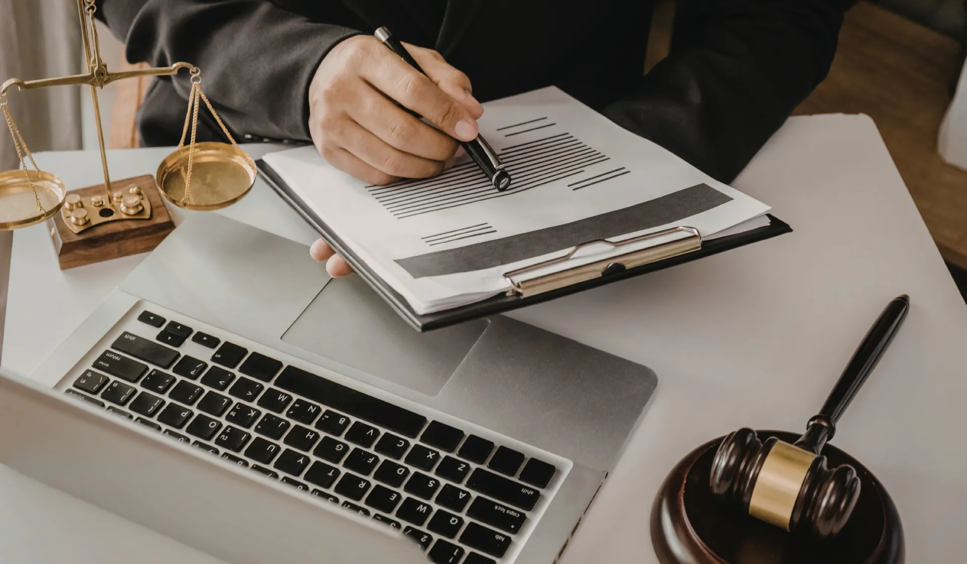 A LeadGulls PPC specialist conducting keyword research for a law firm Google Ads campaign, identifying high-intent legal search terms and evaluating competitor ad positions